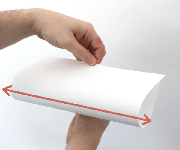 Por que a direção de grãos no papel é importante?